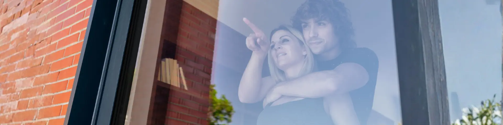 Couple looking out the window